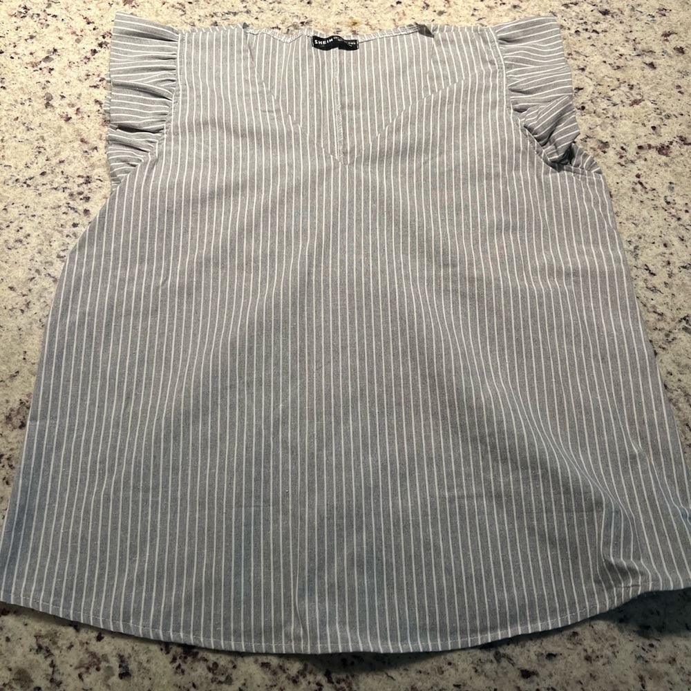 Women’s paper bag shirt with ruffles. Large